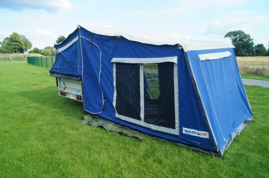 High-quality trailer tent with awning for outdoor camping and family adventures.