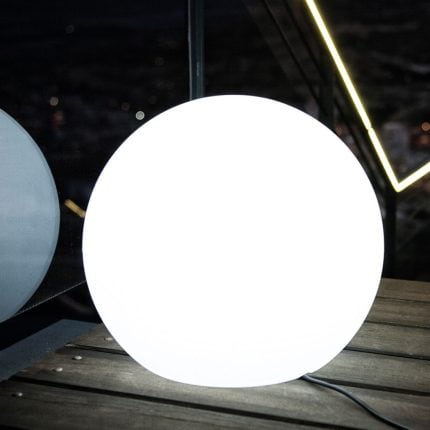 Rechargeable solar-powered LED light for outdoor use, ideal for camping and emergency lighting.