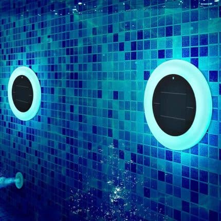 Solar-powered pool lights with LED illumination for outdoor swimming pools.