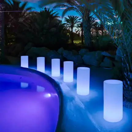 Tuby 70 Solar Smarrtech outdoor lighting with illuminated cylindrical solar lamps.