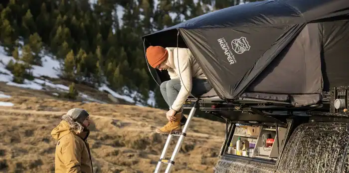 IKamper Skycamp 3.0 rooftop tent set up on vehicle for outdoor camping.