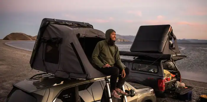 Portable rooftop tent for camping adventures with iKamper Skycamp 3.0 on a rugged vehicle.