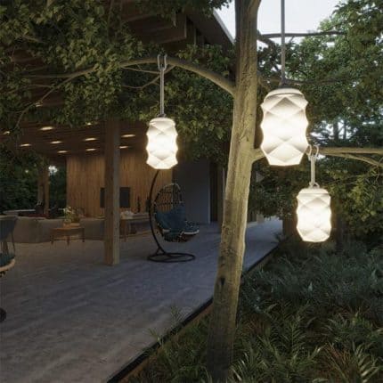 Outdoor hanging lanterns illuminating a cozy patio area.
