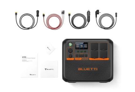 Portable Bluetti AC200PL power station with multiple charging cables for outdoor use.