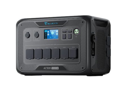 Portable Bluetti AC500 power station for outdoor camping and emergency backup.