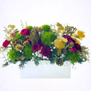 Luxury Christmas centerpiece with red roses and evergreen textures