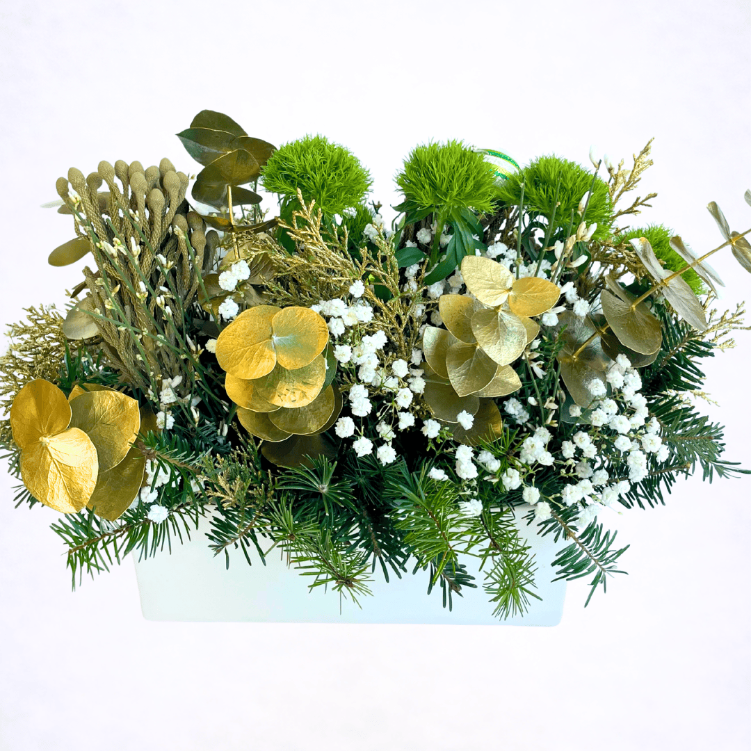 Luxury Christmas evergreen centerpiece with gold holiday accents