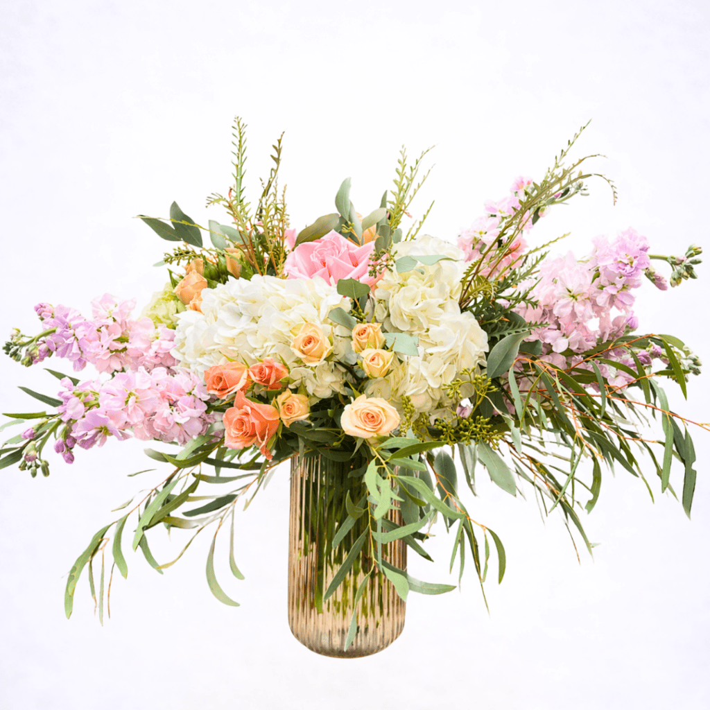 Luxury designer’s choice flower arrangement in blush and cream tones