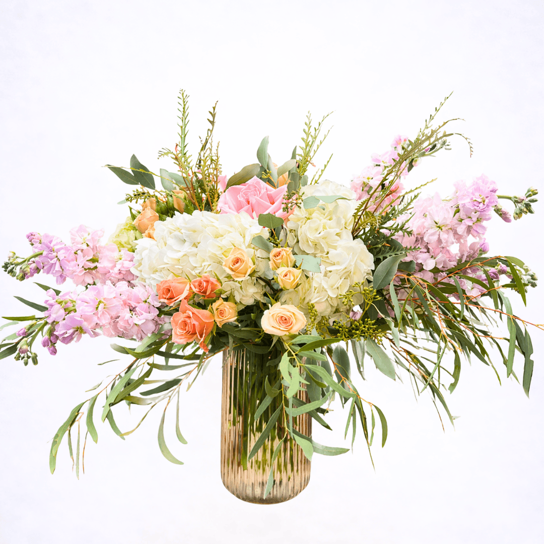 Luxury designer’s choice flower arrangement in blush and cream tones