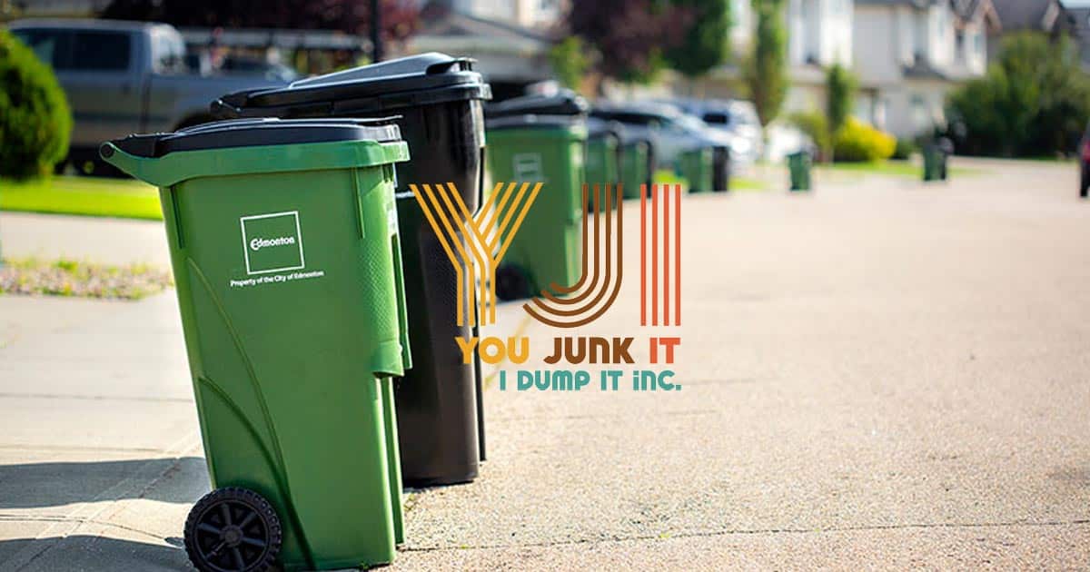 Green and black trash bins on a residential street with You Junk It… I Dump It logo overlay.