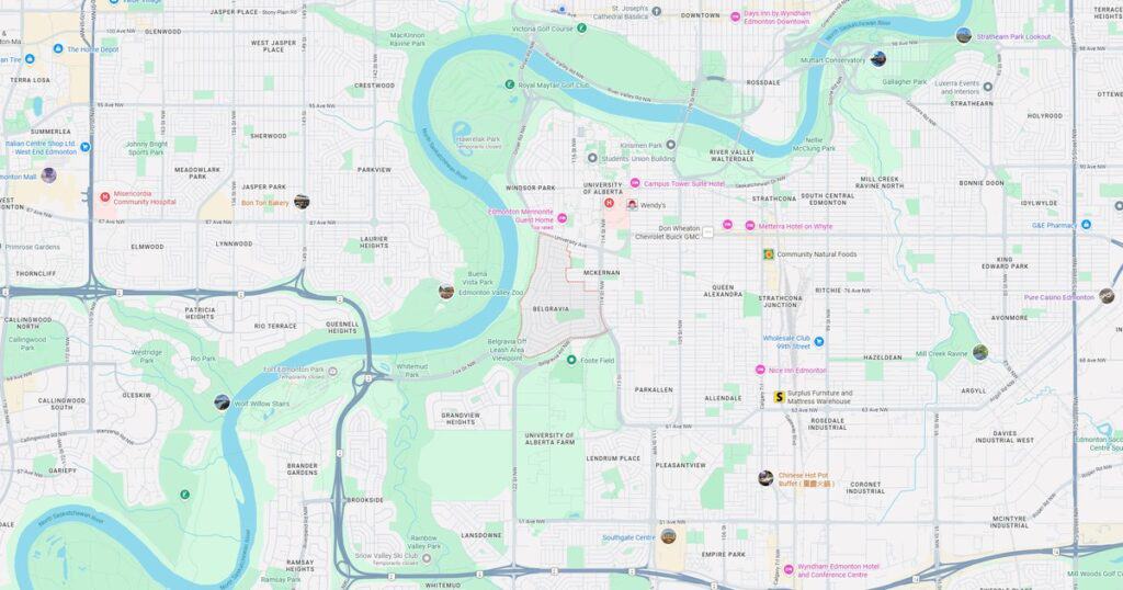 Relaxing view of Edmonton River Valley with lush greenery, winding river, parks, and pathways. Ideal for outdoor activities, walking, and enjoying nature.