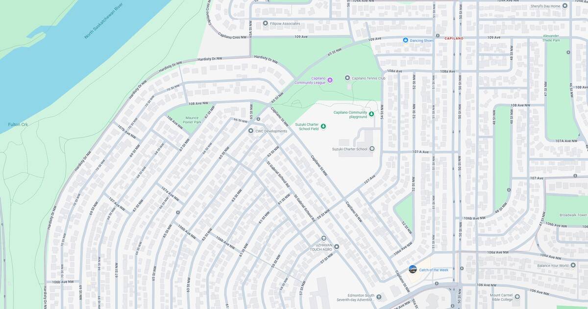 Detailed map of a suburban residential area showing streets, parks, and nearby water body for navigation and urban planning.