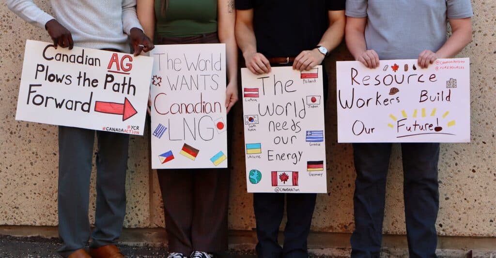 Diverse young Canadians holding signs advocating for responsible resource development and energy needs.
