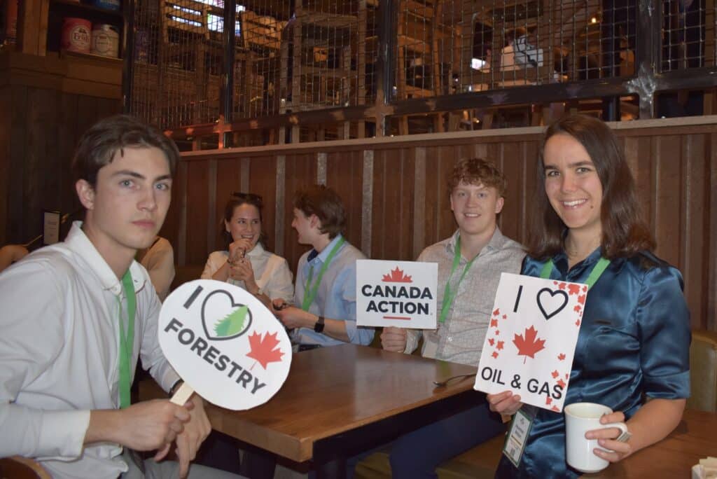 Young Canadians for Resources supporting Canadian forestry, oil, and gas industries at a conference.