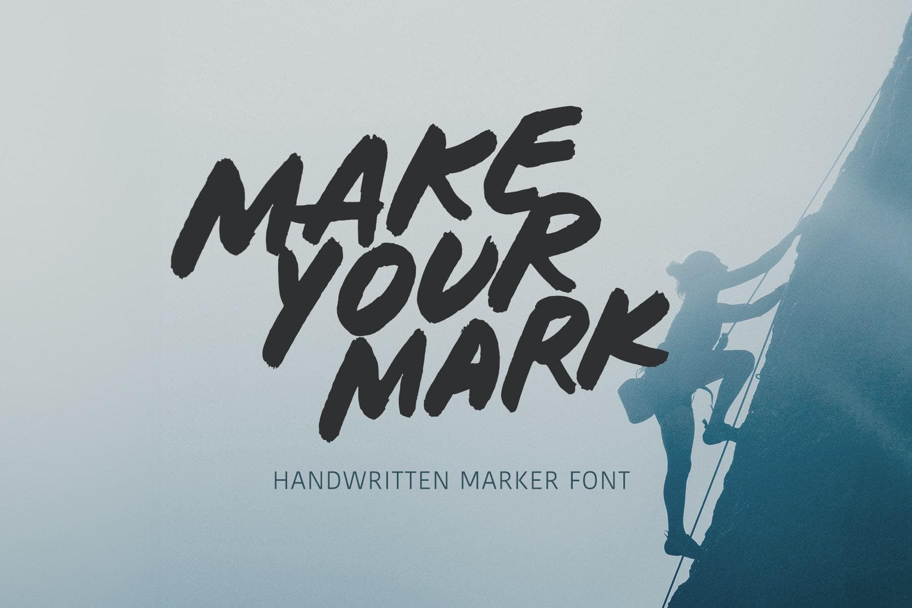 Make your mark handwritten marker font logo with a mountain climber graphic.