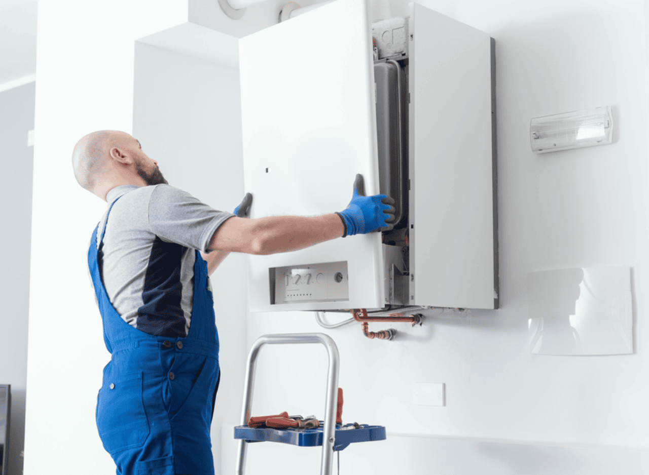 Plumber checking hot water system runs safely and efficiently with expert testing and diagnostics.