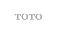 TOTO company logo in gray text on light background