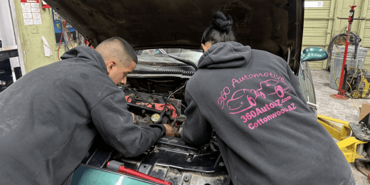 Technicians working on a vehicle engine at 360 Auto AZ repair shop.