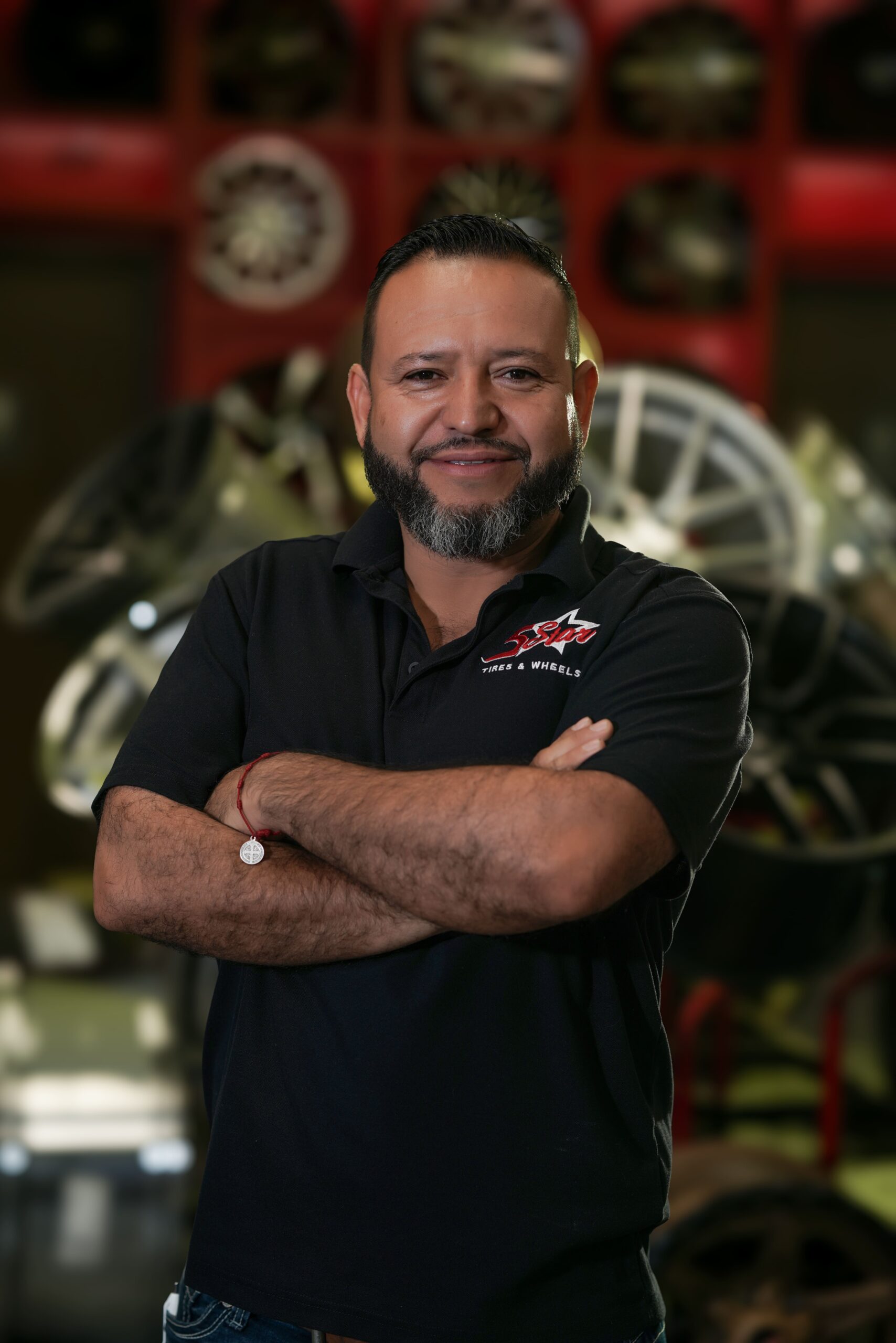 Friendly tire specialist at 5 Star Tires and Wheels store.