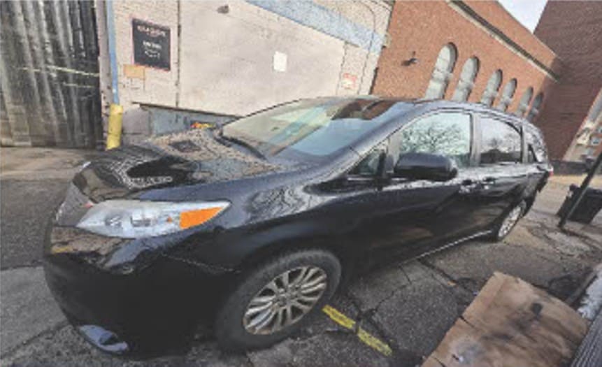 Car repair service at 770 Auto Service in an urban setting.