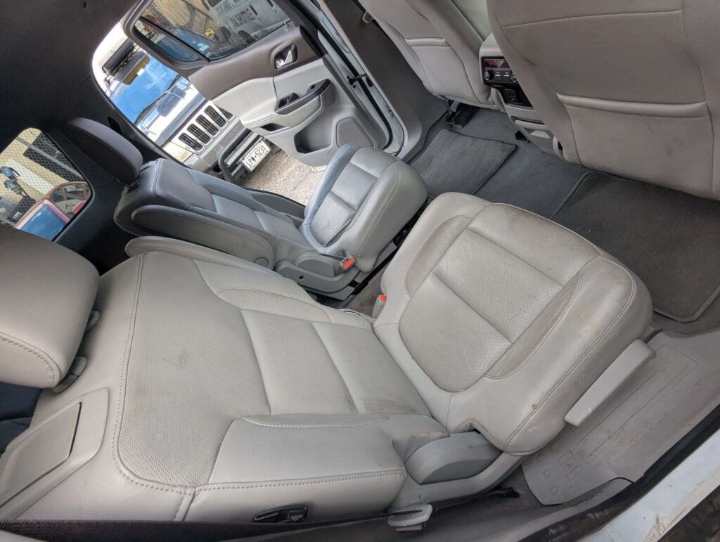 Interior car seats and dashboard in a clean vehicle at 770 Auto Service.
