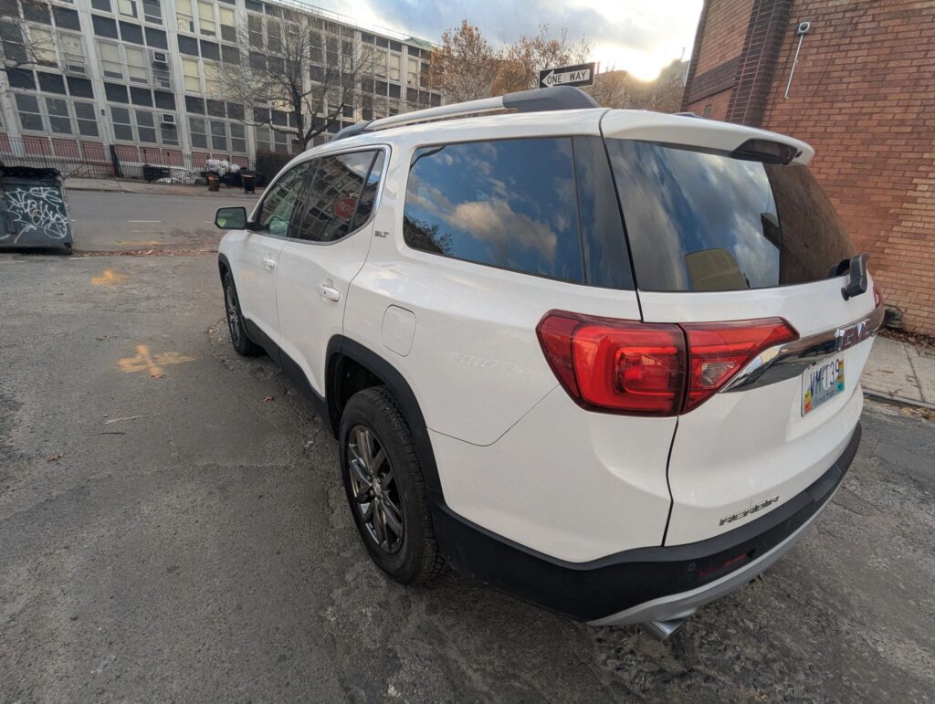 SUV parked at auto repair shop.