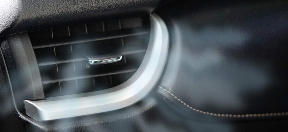 Air vent in vehicle dashboard for efficient AC and heating airflow.
