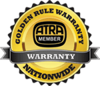 Warranty badge for AA Transmission services.