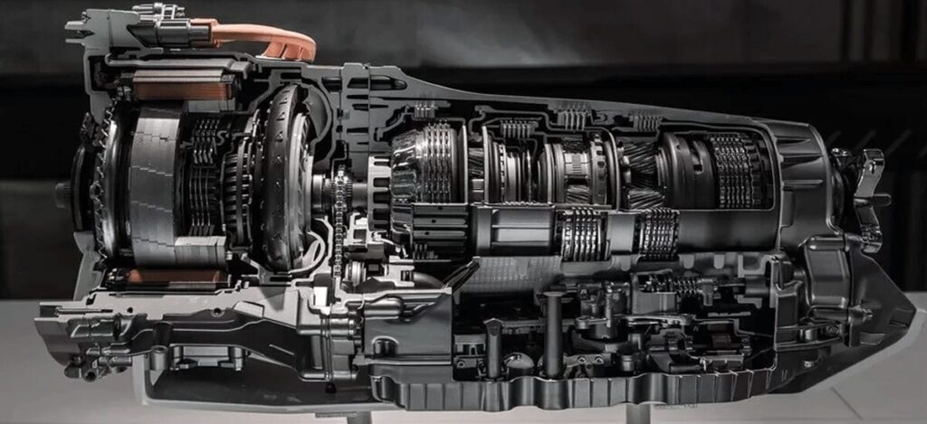 Transmission system cross-section showing internal gears and components.