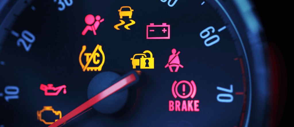 Auto repair dashboard warning lights with engine, brake, and oil indicators.