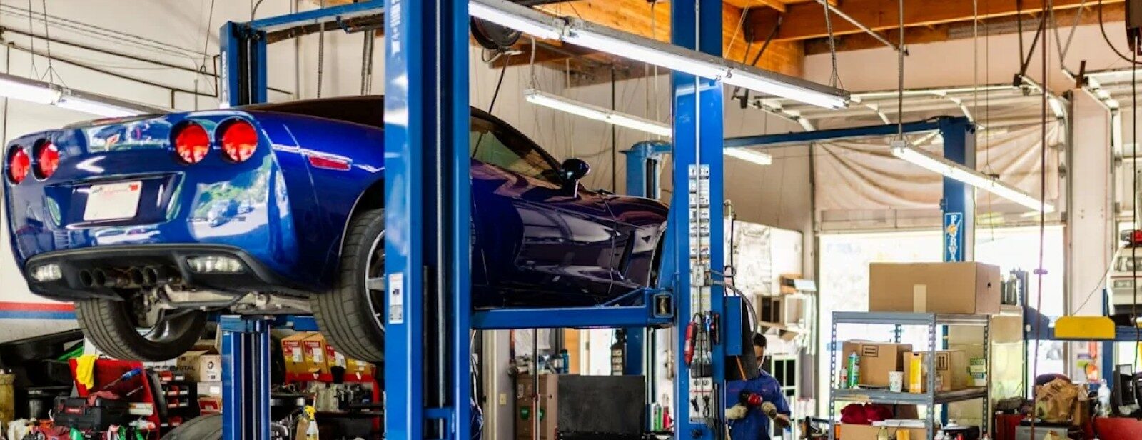 Car repair lift in Aliso Viejo auto service shop.