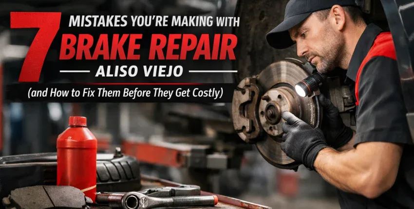 Auto mechanic inspecting brake system at Aliso Viejo auto service center.
