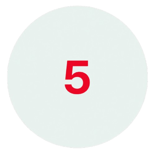 Close-up of a white circular indicator with the number 5 in red.