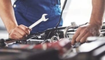 Optima car maintenance and repair services in Al’s Automotive shop.
