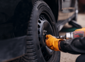 Professional tire repair and maintenance service at Apex Auto Center.