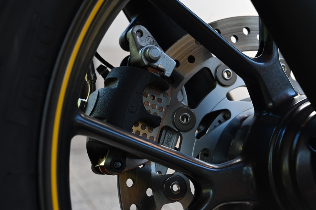 Brake system component on a motorcycle wheel for safe riding.