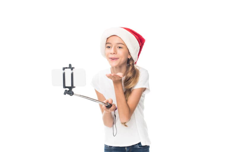Teenager taking selfie on Christmas