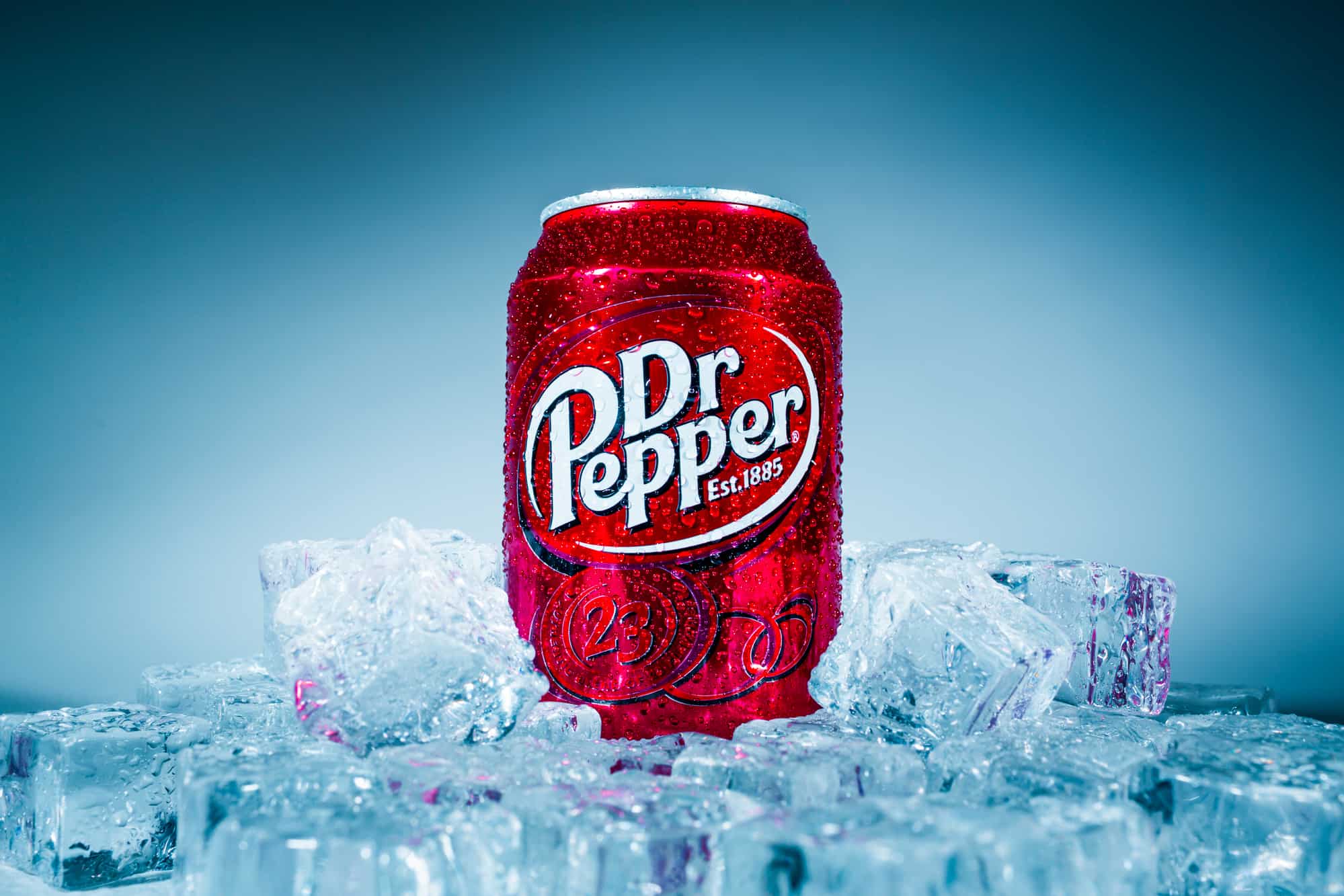 MOSCOW, RUSSIA-APRIL 4, 2014: Can of Dr Pepper soft drink on ice. Dr Pepper is a soft drink marketed as having a unique flavor. The drink was created in the 1880s.
