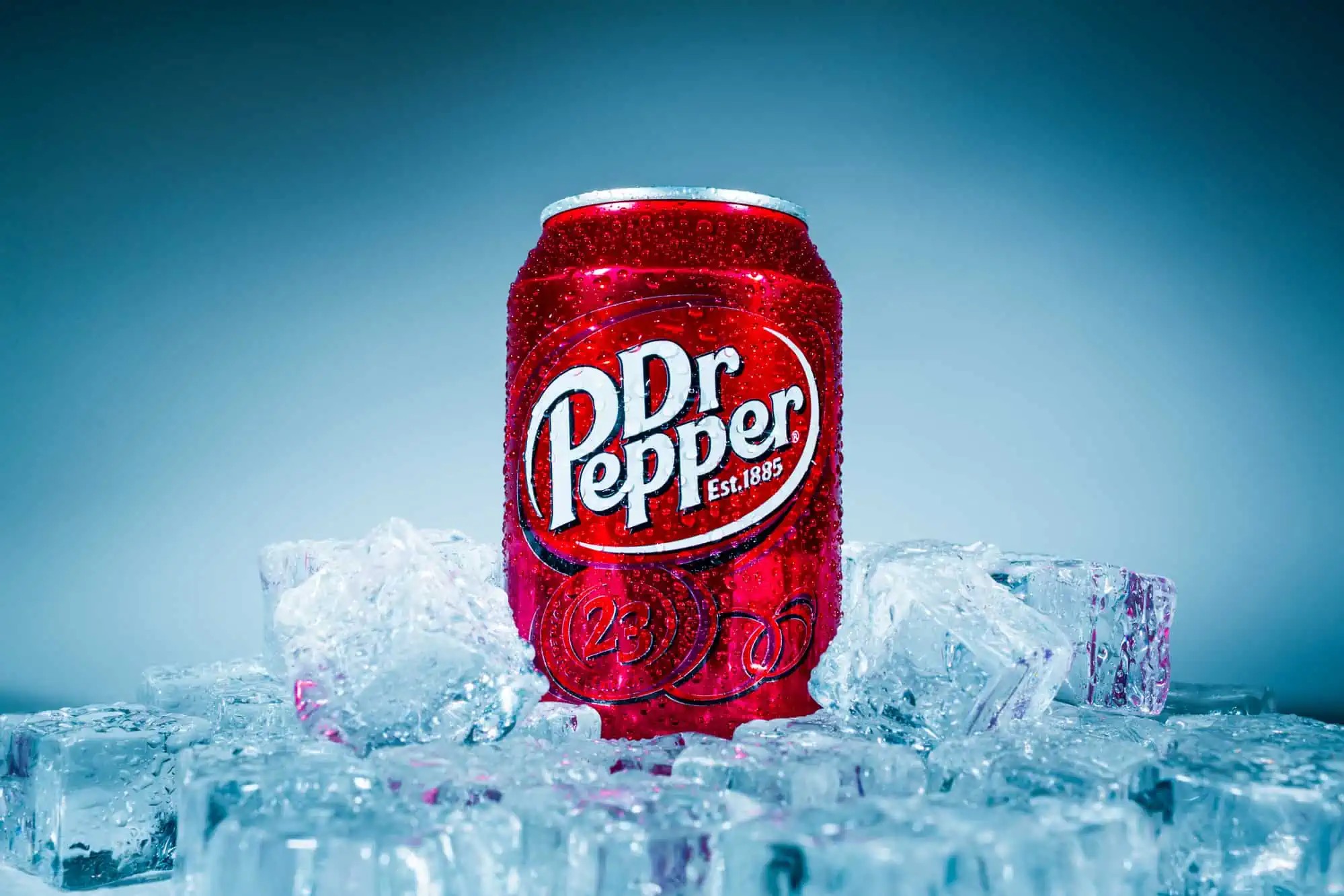 MOSCOW, RUSSIA-APRIL 4, 2014: Can of Dr Pepper soft drink on ice. Dr Pepper is a soft drink marketed as having a unique flavor. The drink was created in the 1880s.
