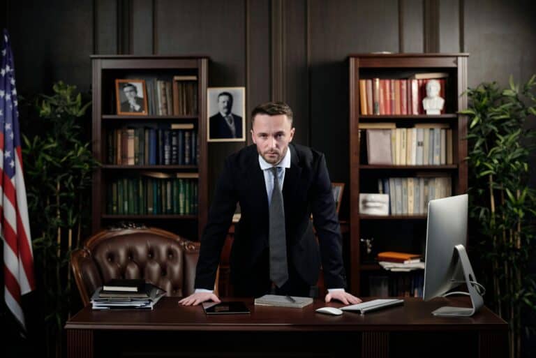 businessman-in-his-office-looking-at-the-camera
