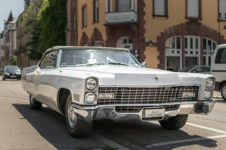 Vintage White Coupe on Road