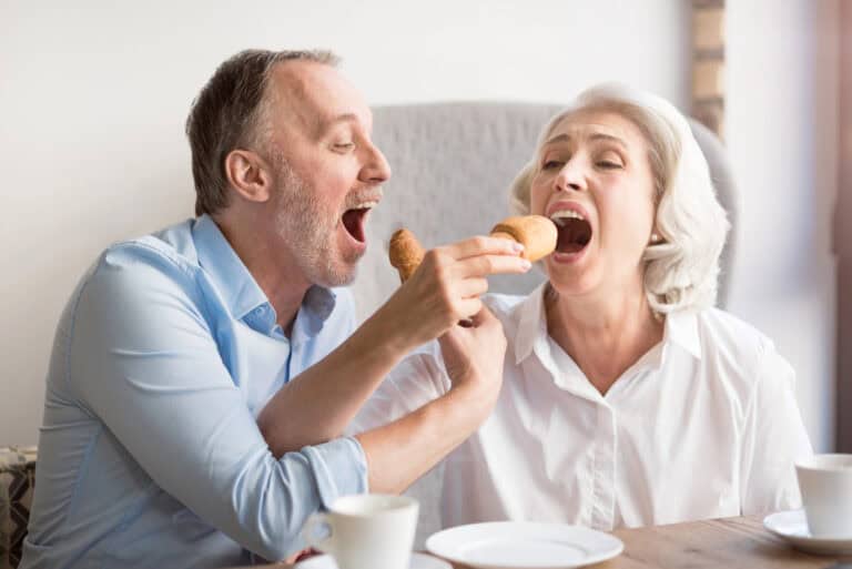 Positive couple having lunch
