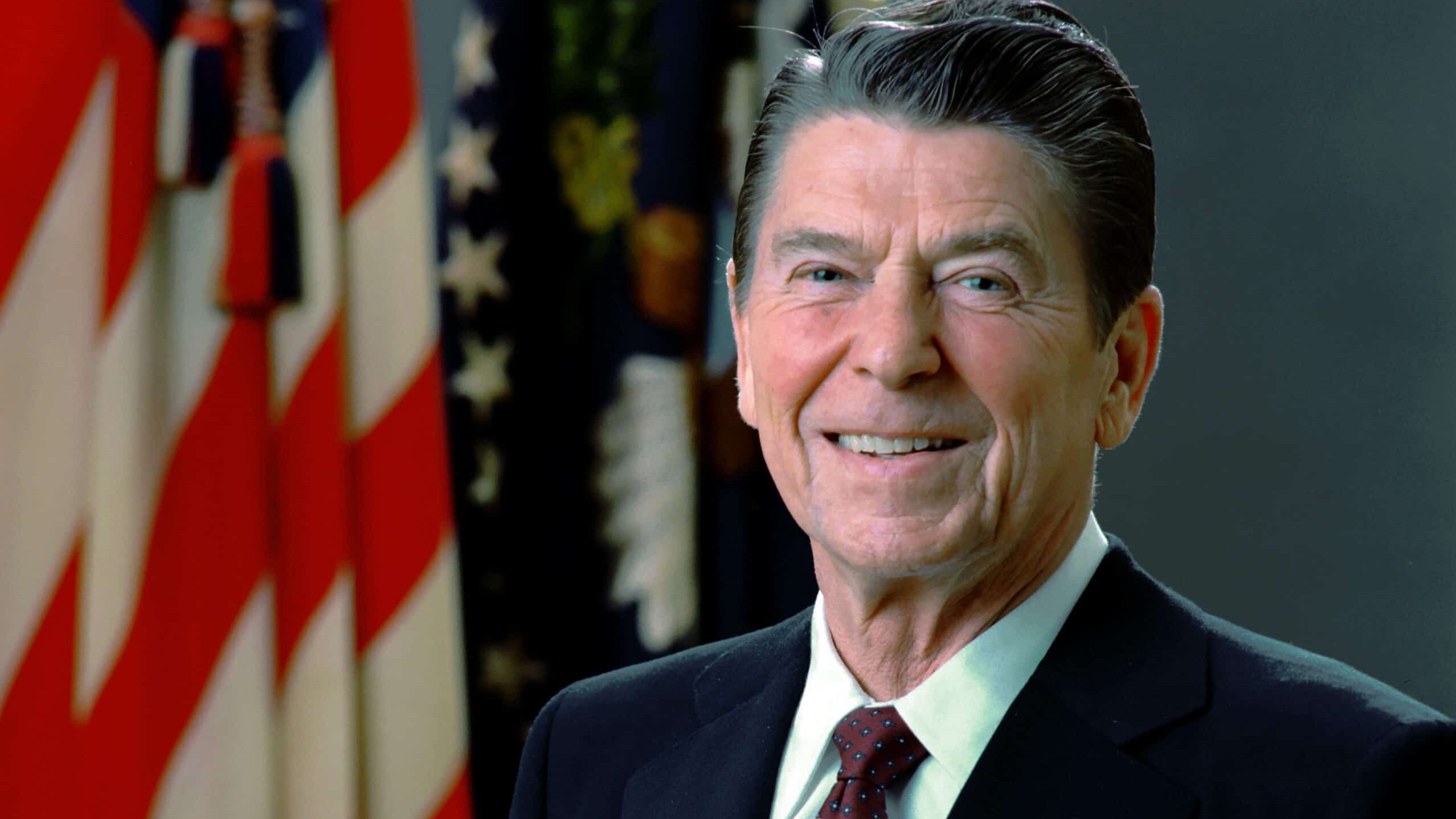 Photo of Ronald Reagan in front of an American flag