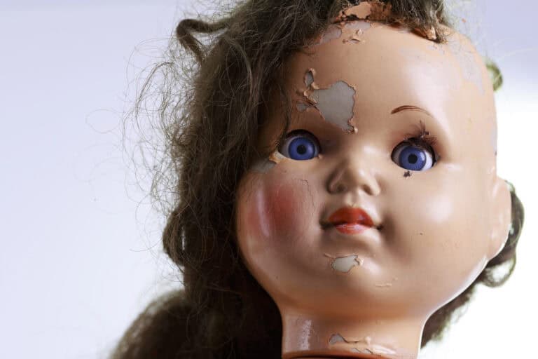 Head of beatiful scary doll like from horror movie