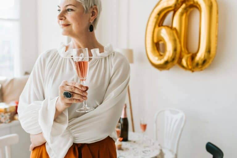 Senior Woman Holding a Drink - 60