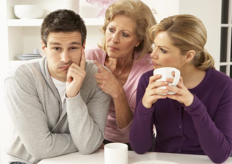 Senior Mother Interferring With Couple Having Argument At Home