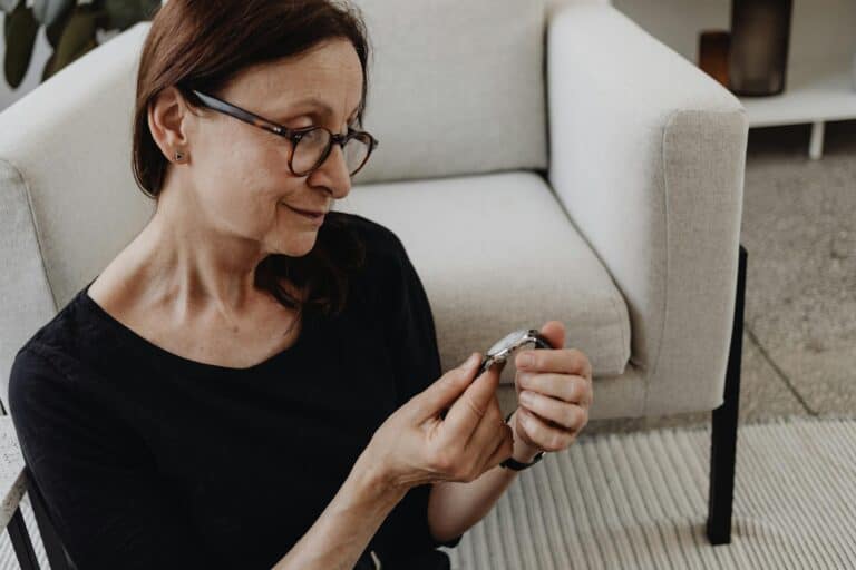 Elderly Woman Looking the Wristwatch