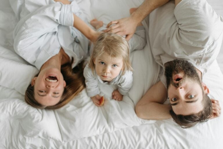 Happy Family on the Bed