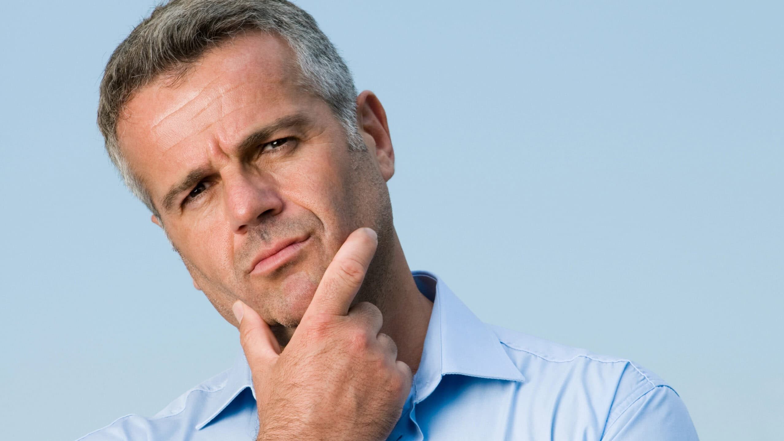 Perplexed mature man. Confused.