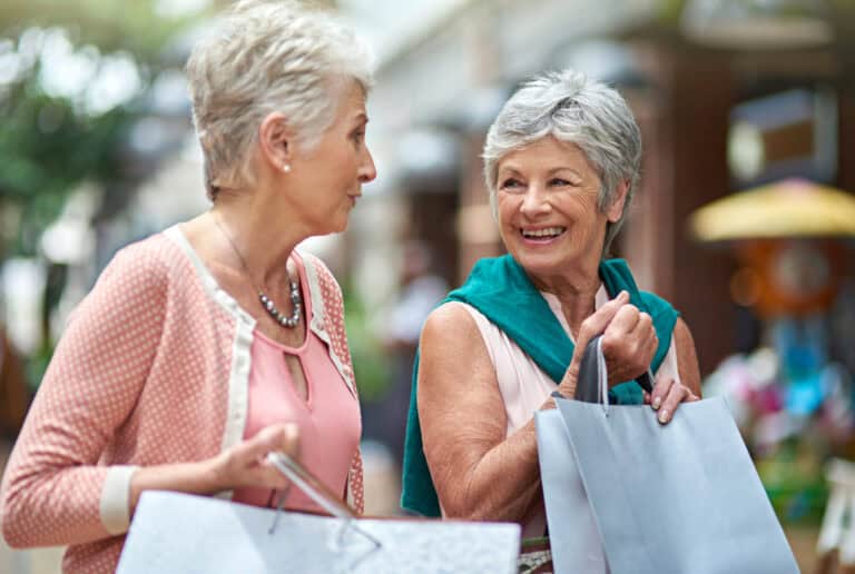 Ive still got a few more bucks to spend. a two senior women out on a shopping spree